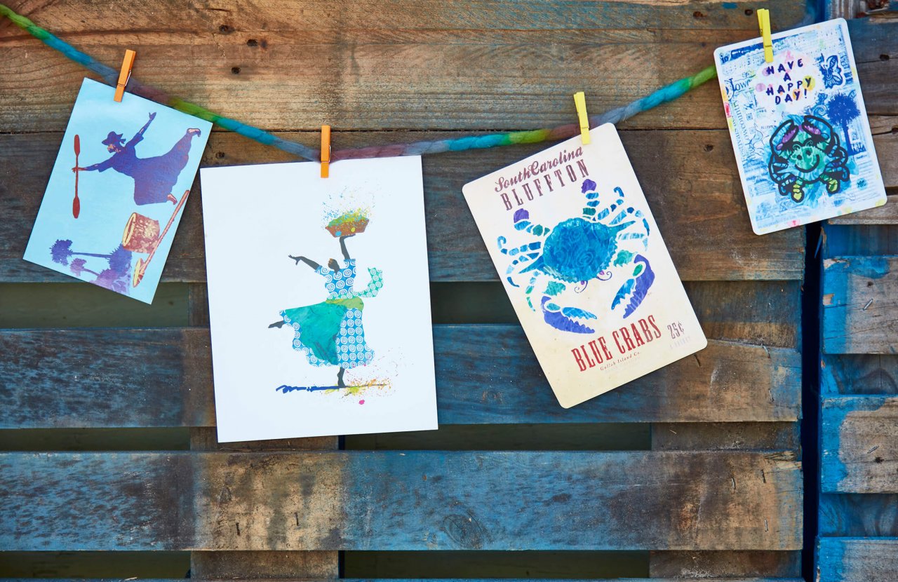 colourful watercolour illustrations hung on a clothes line